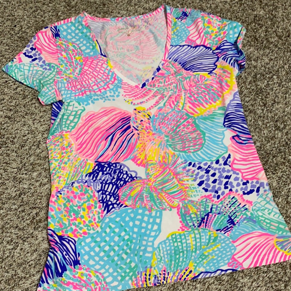 Lilly Pulitzer Michele she’ll size medium.